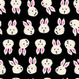 a repeating pattern of stylized white rabbit faces against a black background.