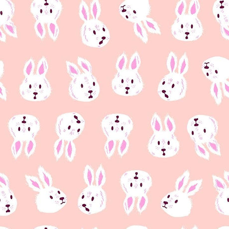 a repeating pattern of white bunny faces on a pink background.