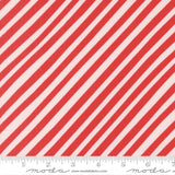 a close-up view of a fabric with diagonal red and white stripes.