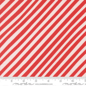 a close-up view of a fabric with diagonal red and white stripes.