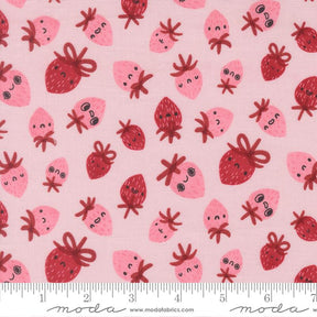 a repeating pattern of pink and red cartoon-style strawberries with faces and bows on a light pink background.