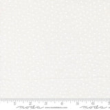 The image is a fabric with a white polka dot pattern.