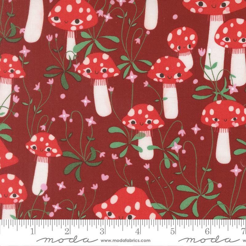 a pattern of red and white mushrooms with green leaves and flowers on a dark red background.