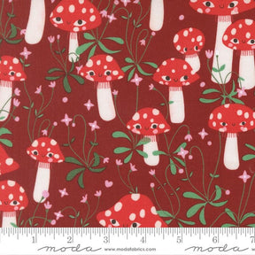 a pattern of red and white mushrooms with green leaves and flowers on a dark red background.
