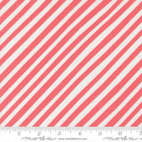 a close-up view of a fabric with diagonal red and white stripes.