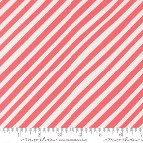 a close-up view of a fabric with diagonal red and white stripes.