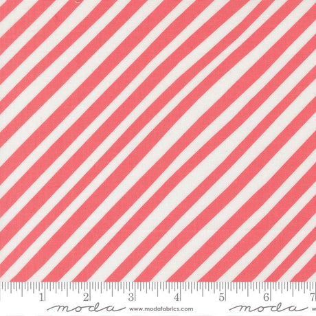 a close-up view of a fabric with diagonal red and white stripes.