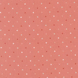 a pattern of small white dots on a reddish-brown background.