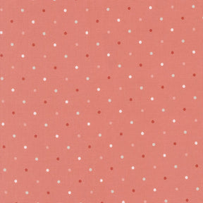 a pattern of small white dots on a reddish-brown background.