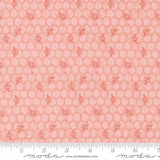 a repeating pattern of small hexagonal shapes in a light pink color, resembling a honeycomb design.