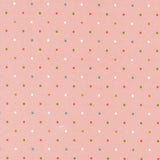 a pink background with a pattern of small white and multicolored dots arranged in a grid-like fashion.