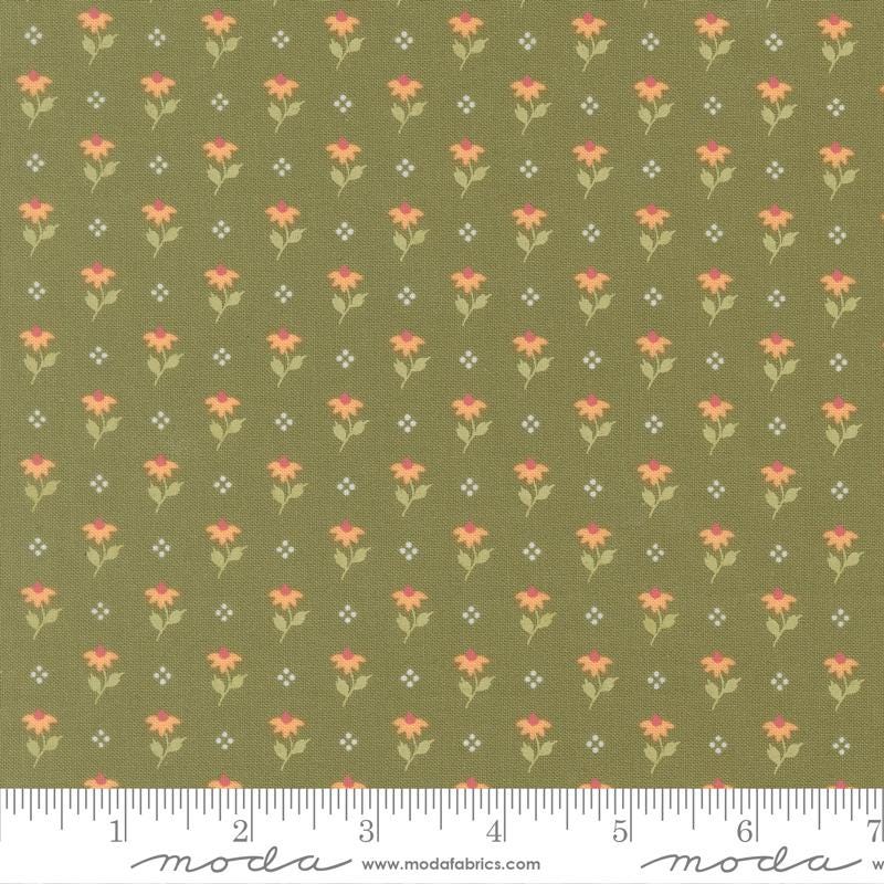 a repeating pattern of small green flowers with orange centers, arranged in a grid-like fashion.