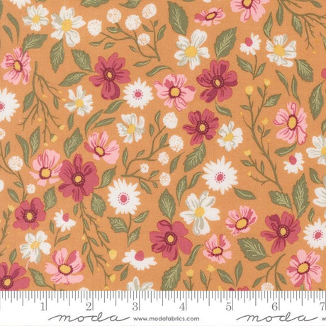 The image is a fabric with a floral pattern of various flowers and leaves in shades of pink, white, and orange.