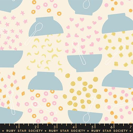 The image is a collage of various food items and kitchen utensils, including bowls, spoons, and donuts, arranged in a playful and whimsical manner.