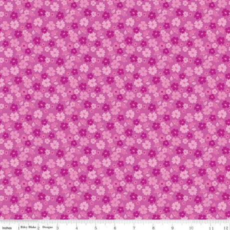a repeating pattern of pink and white flowers on a pink background.