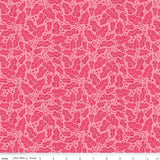 a repeating pattern of pink leaves and dots on a pink background.