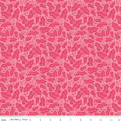 a repeating pattern of pink leaves and dots on a pink background.
