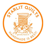 a logo for a company called "Starlit Quilts" that specializes in handmade quilts. The logo includes a spool of thread, a needle, and some flowers, all set within an orange circle. The text "STARLIT QUILTS HANDMADE IS BEST!" is displayed around the circle, emphasizing the company's focus on handmade quilts.