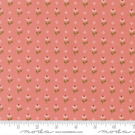 a repeating pattern of pink flowers with green leaves on a fabric surface.