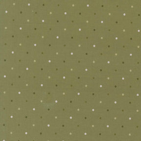 a pattern of small white dots on a green background.