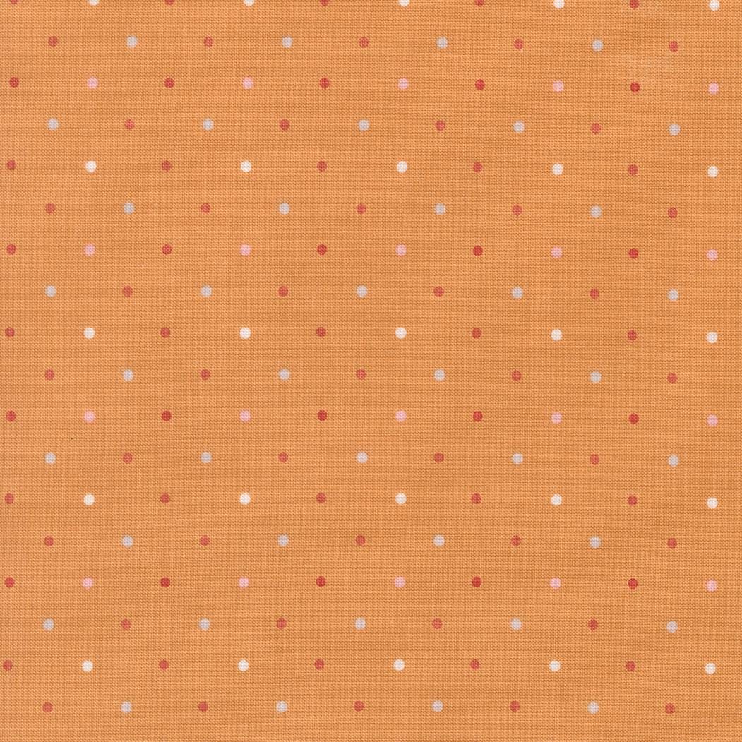a repeating pattern of small white and red dots on a light orange background.