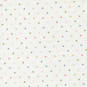 a white background with a pattern of multicolored polka dots.