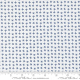 The image is a fabric with a repeating pattern of small blue flowers or leaves. The pattern is evenly spaced and covers the entire fabric. The fabric appears to be made of a material with a white background, and the image is described in terms of its size and the number of blue flowers or leaves it contains.