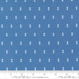 a blue fabric with white dots arranged in a grid pattern.