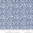 The image is a close-up of a fabric with a blue floral pattern.