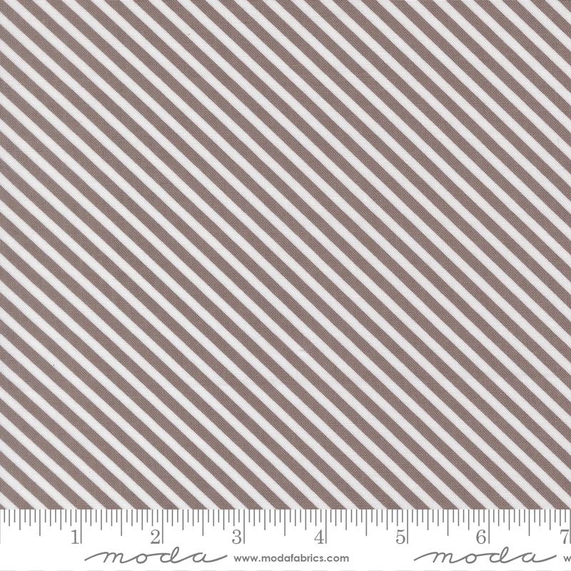 a repeating diagonal pattern of brown and white stripes.