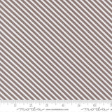 a repeating diagonal pattern of brown and white stripes.