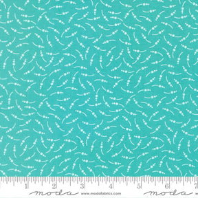 a fabric with a teal blue color and a repeating pattern of white dots or lines, creating a visually interesting and textured design.