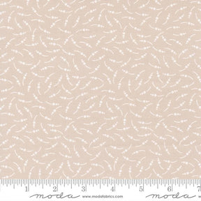 The image is a fabric with a repeating pattern of small white dots or circles, creating a textured and visually interesting design.