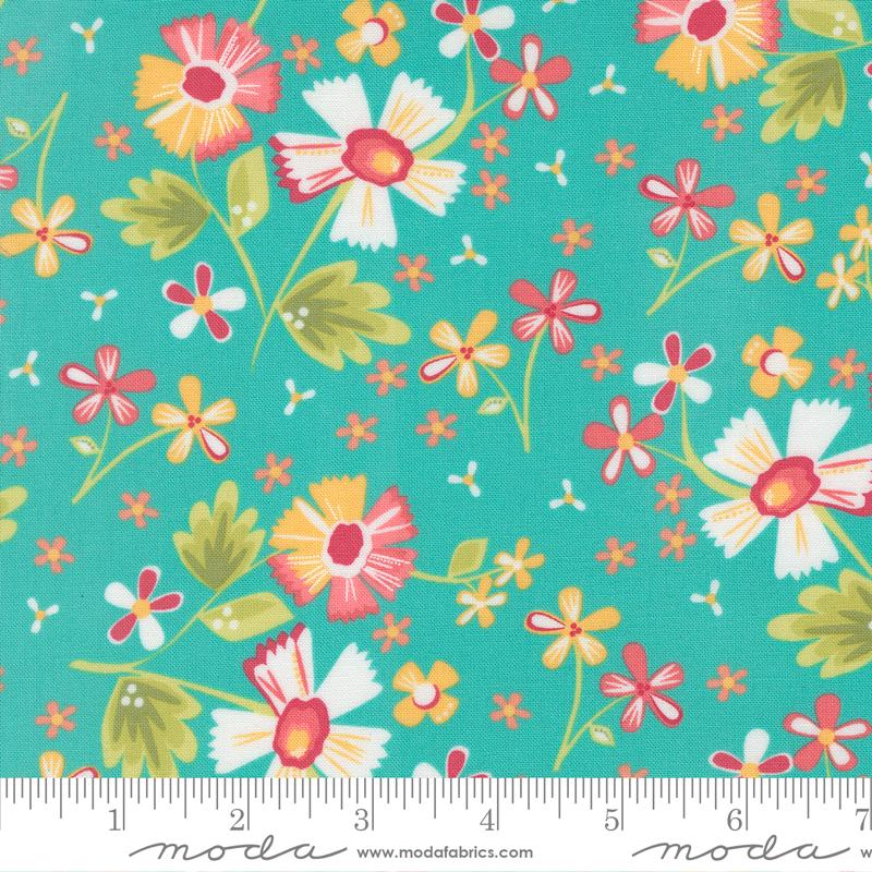 The image is a vibrant and colorful fabric with a repeating pattern of flowers in various shades of pink, yellow, and green against a teal background.