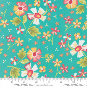 The image is a vibrant and colorful fabric with a repeating pattern of flowers in various shades of pink, yellow, and green against a teal background.