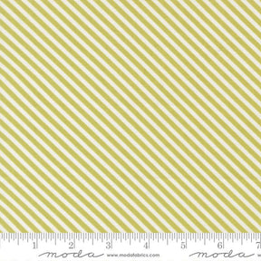 a repeating diagonal pattern of yellow and white stripes, with a ruler indicating the size of the fabric.