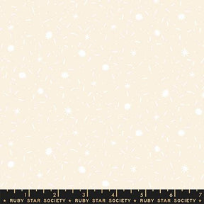 The image is a light beige background with white stars scattered throughout, creating a starry night sky effect.