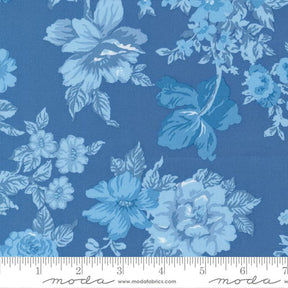 a blue floral pattern with various blue flowers and leaves against a dark blue background.
