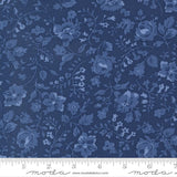 The image is a close-up of a fabric with a blue floral pattern.