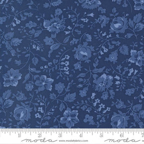 The image is a close-up of a fabric with a blue floral pattern.