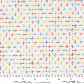 The image is a fabric with a repeating pattern of colorful snowflakes on a white background.