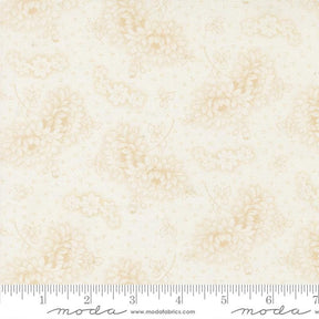 The image is a fabric with a floral pattern, featuring a repeating design of flowers and leaves in various shades of beige.