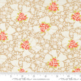 The image is a fabric with a floral pattern, featuring white flowers with red centers. The fabric appears to be a light brown color, and there is a ruler for scale at the bottom of the image.