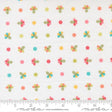 The image is a fabric with a repeating pattern of colorful flowers and polka dots.