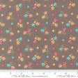 a repeating pattern of small, colorful flowers on a brown background.