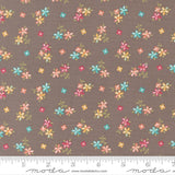 a repeating pattern of small, colorful flowers on a brown background.