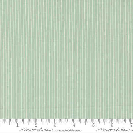 The image is a close-up of a fabric with a striped pattern in a light green color.
