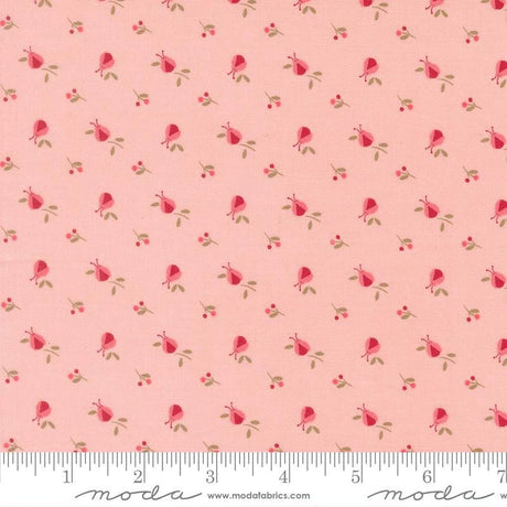 a repeating pattern of pink flowers and leaves on a fabric surface.
