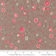 The image is a fabric with a floral pattern, featuring various pink and green flowers and leaves. The fabric appears to be a dark brown color, and there is a ruler at the bottom of the image for scale.