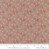a fabric with a floral pattern of red flowers and white flowers. The fabric appears to be a neutral-colored material, possibly beige or brown, with the red flowers and white flowers scattered throughout the pattern. The image does not contain any text or additional objects, and the focus is solely on the floral pattern.